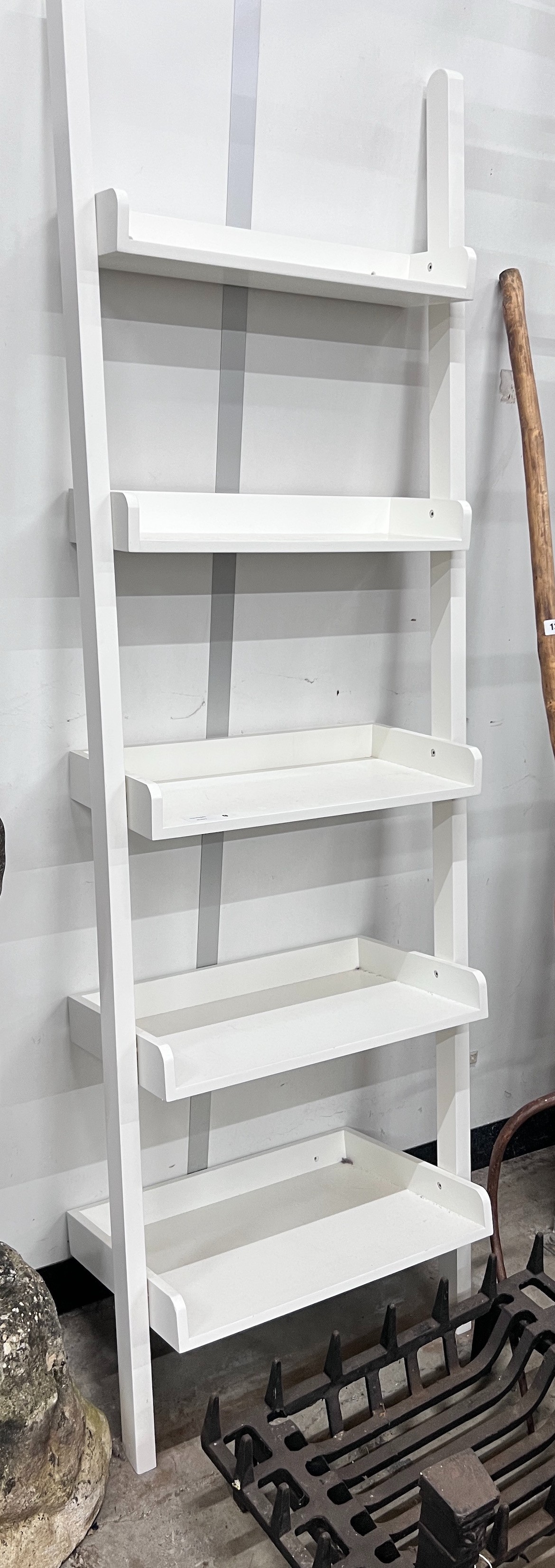 A contemporary graduated shelving unit, height 190cm *Please note the sale commences at 9am.